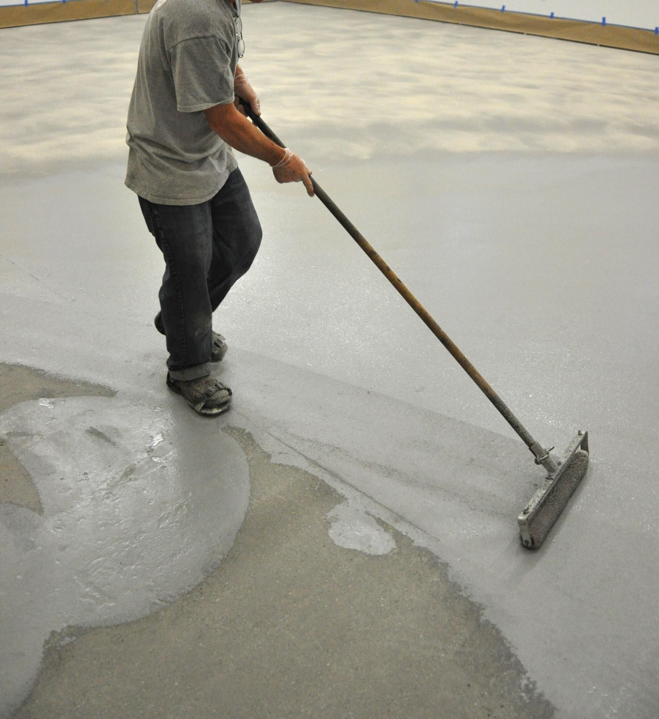 using a roller for floor coating
