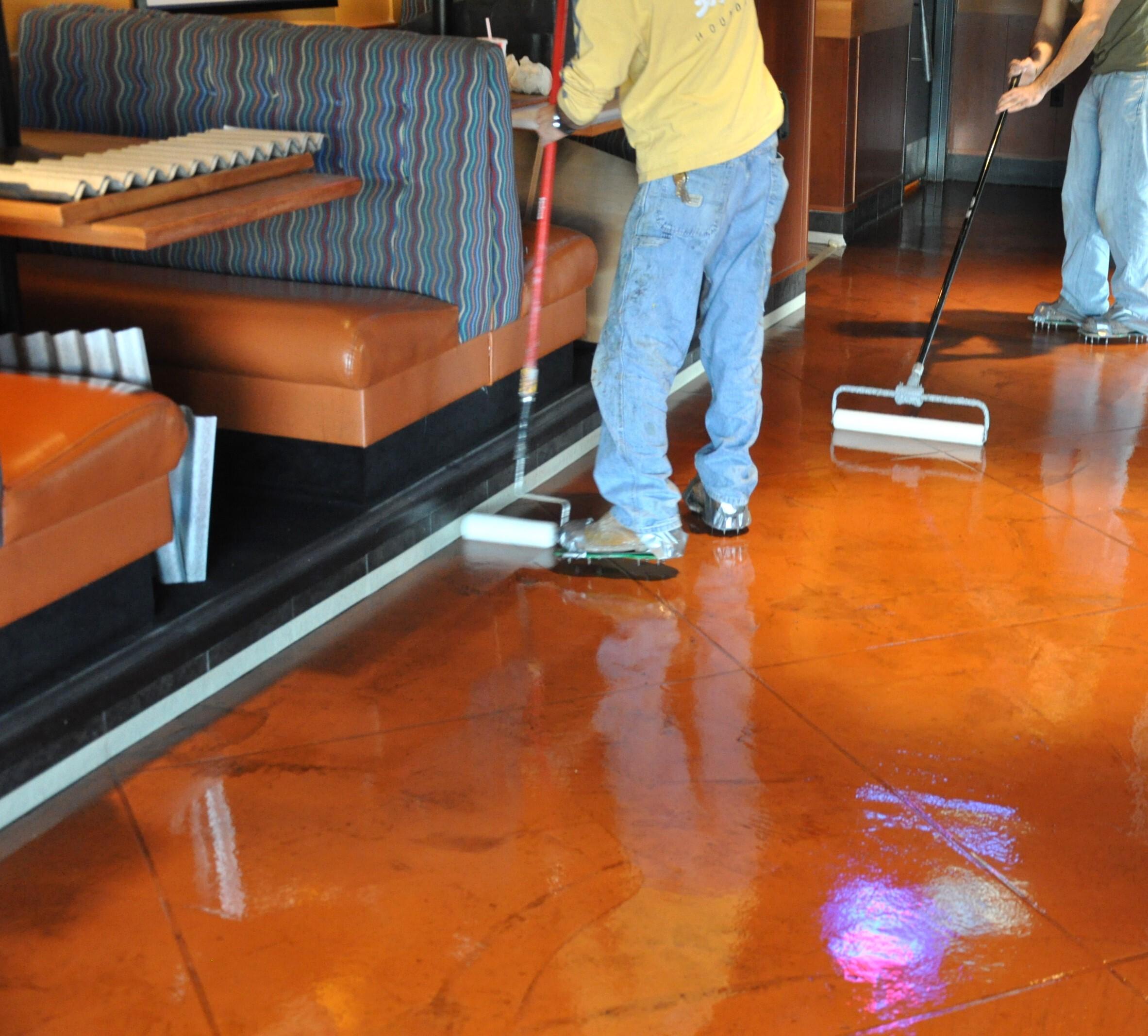 using a roller to apply topcoat