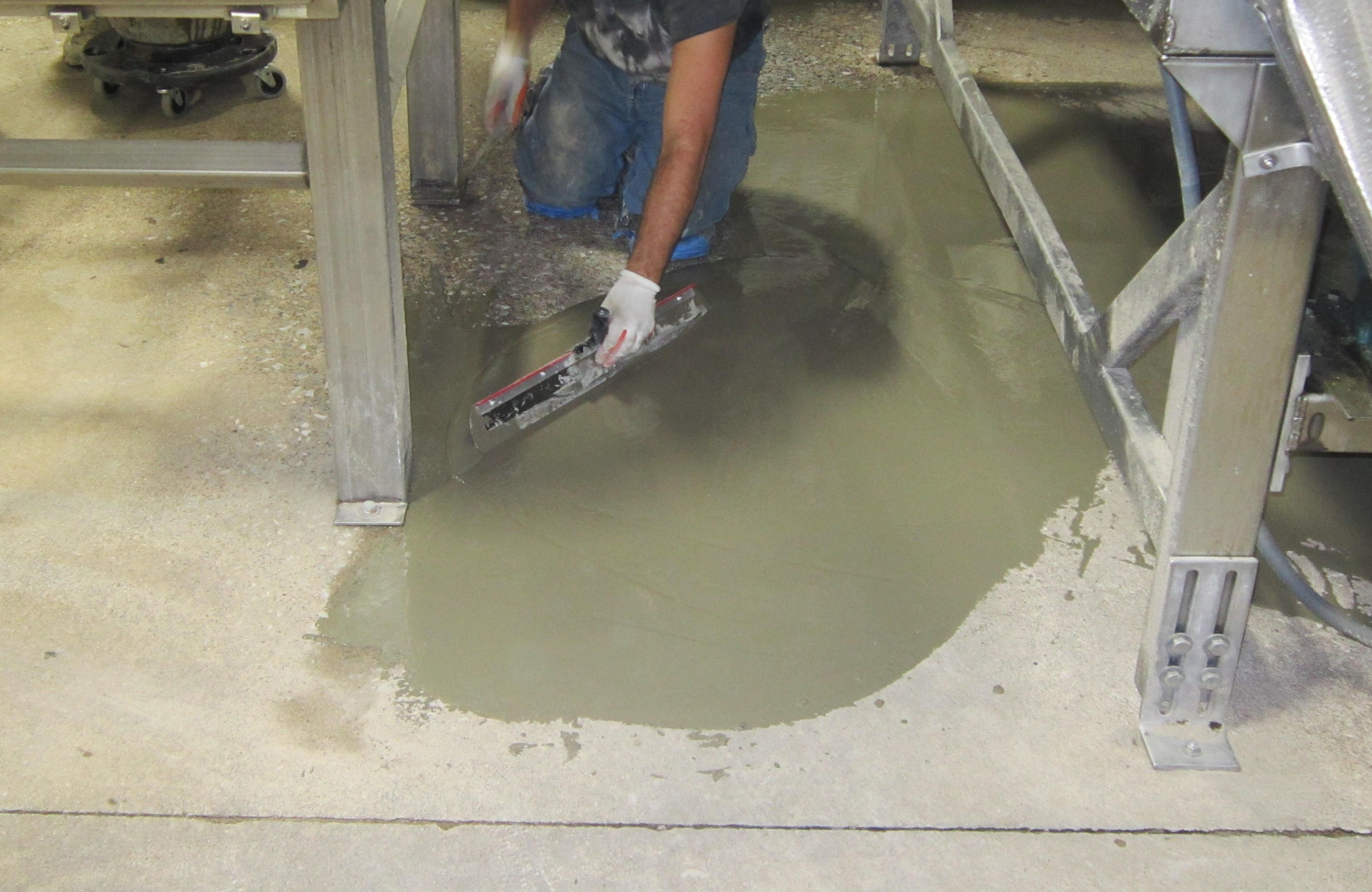 applying pourable concrete with a trowel